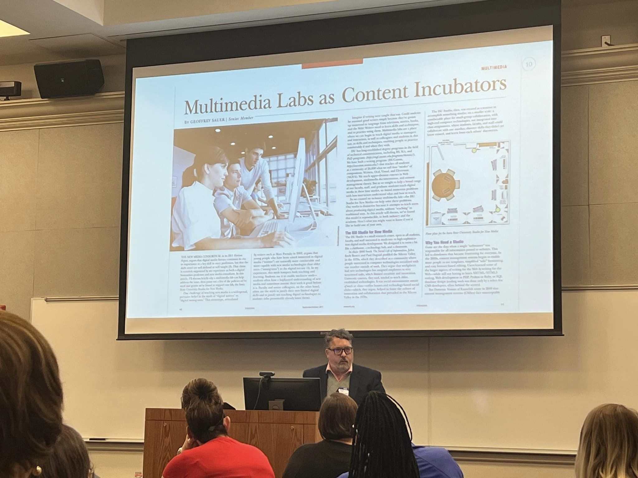 Associate Professor of TCR, Dr. Geoff Sauer giving a presentation