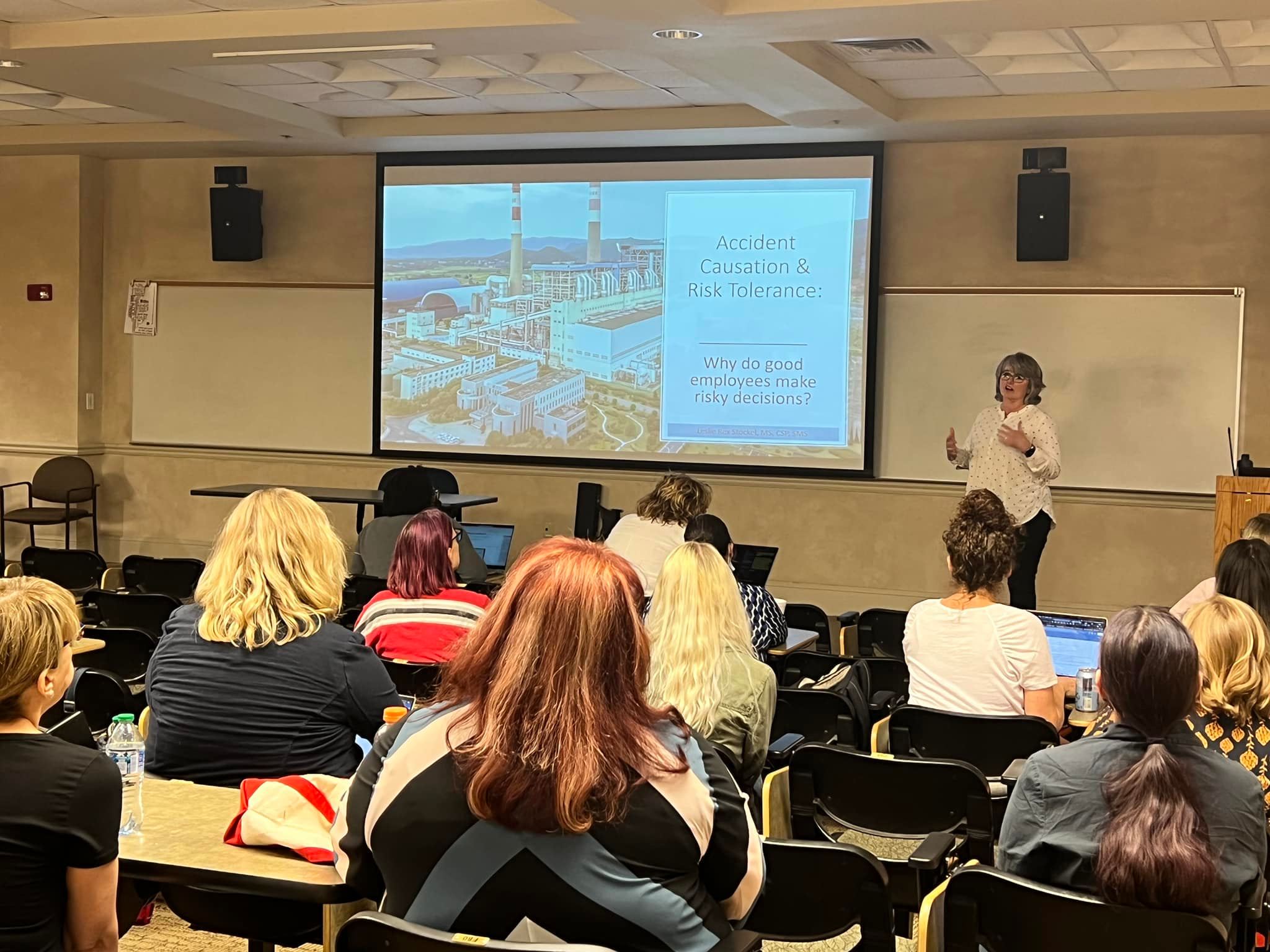Third-year PhD students delivering presentations
